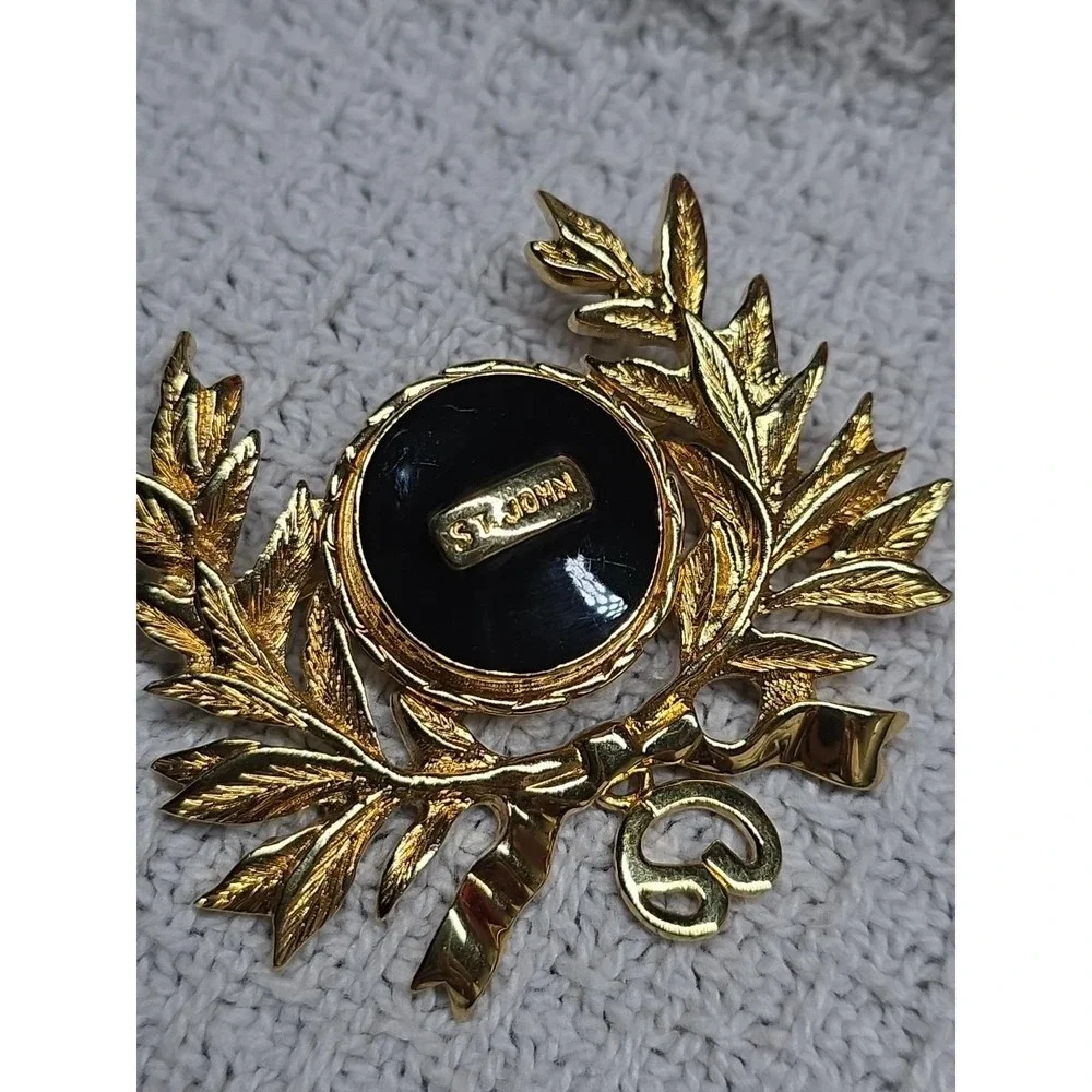 Rare Vintage ST. JOHN Maltese Gold Plated Black Enamel Dangle Logo Pin Brooch